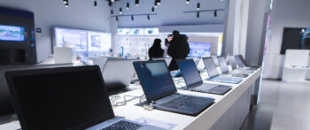 Concept of depreciation depicted by laptops in a shop