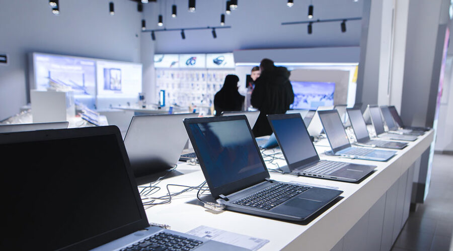 Concept of depreciation depicted by laptops in a shop